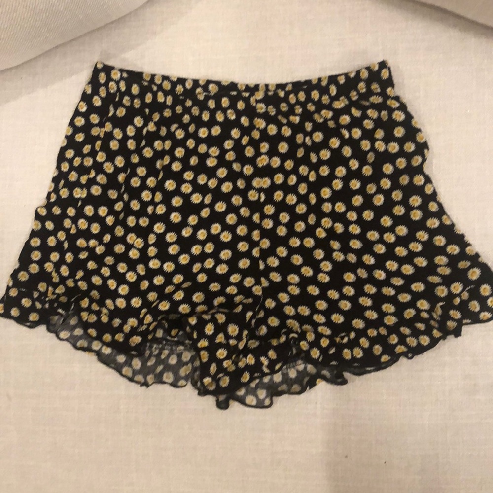 Black rayon shorts with sunflower pattern